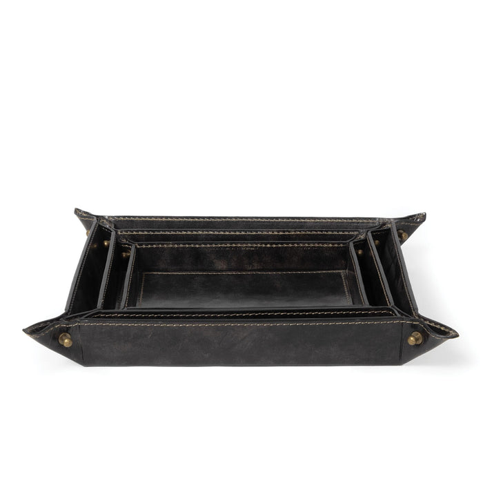 Black genuine leather nesting trays with brass button snaps, modern traditional style.