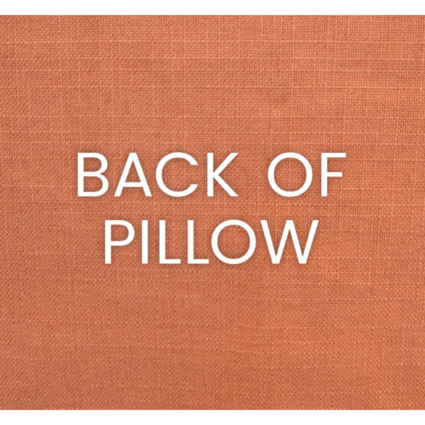 Textured orange-brown polyester fabric, the back of the Descanso throw pillow.
