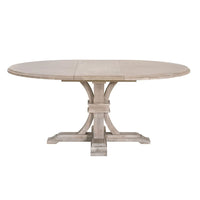 Devon 54" round acacia wood extension dining table in natural gray with a pedestal base.