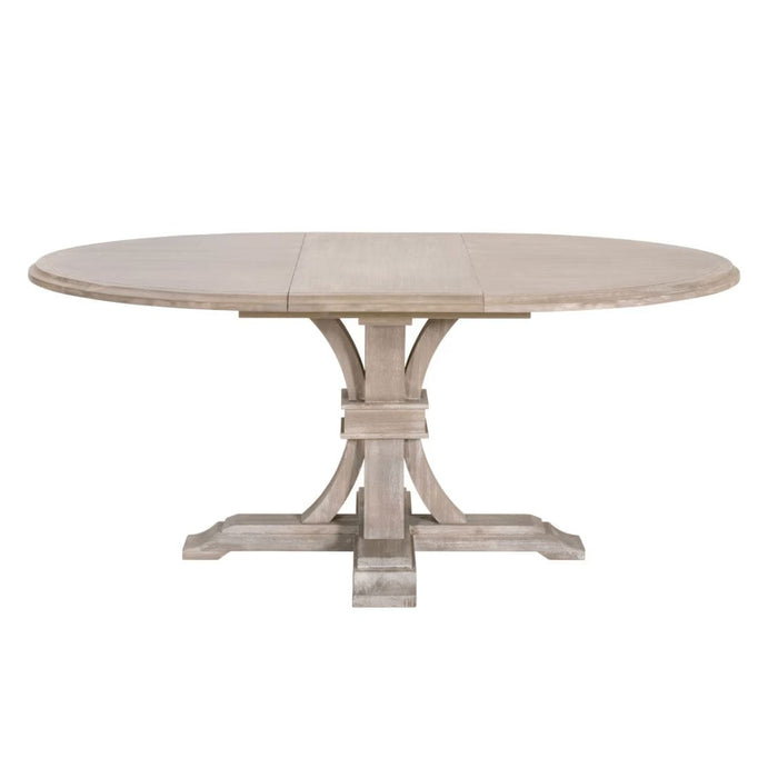 Devon 54" round acacia wood extension dining table in natural gray with a pedestal base.