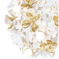 Dogwood Petals Chandelier with matte white and gold leaf floral design, concealed glass globe lights.