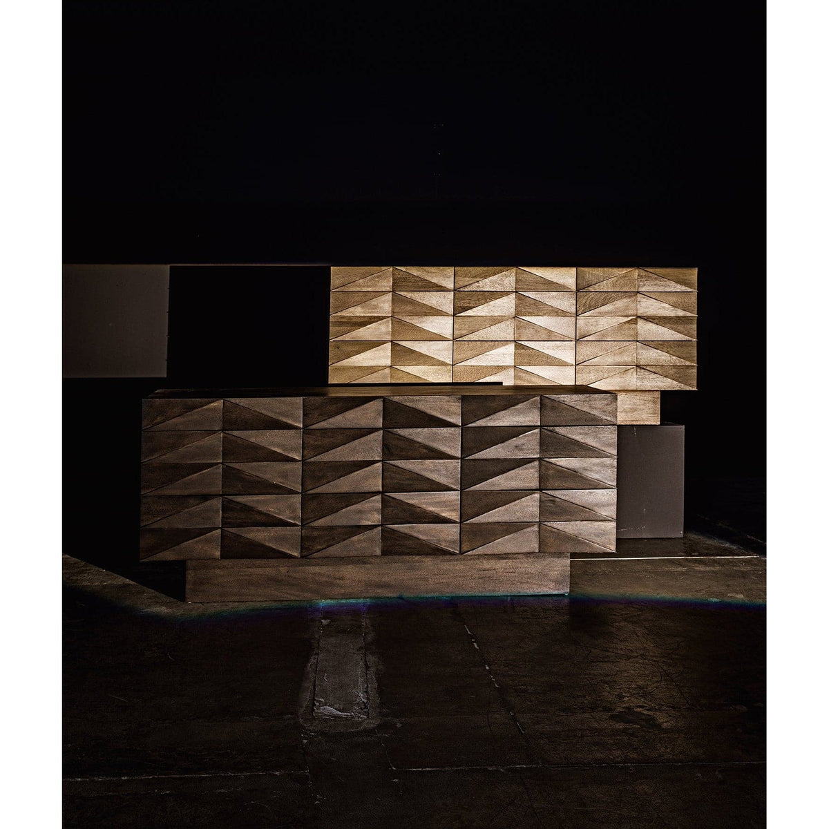 Washed walnut sideboard with nine hand-carved, geometric pattern drawers.