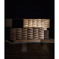 Washed walnut sideboard with nine hand-carved, geometric pattern drawers.