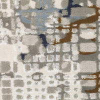 Easton Blue & Ivory Casual Rug with textured abstract design in blue, gray, brown, and ivory.