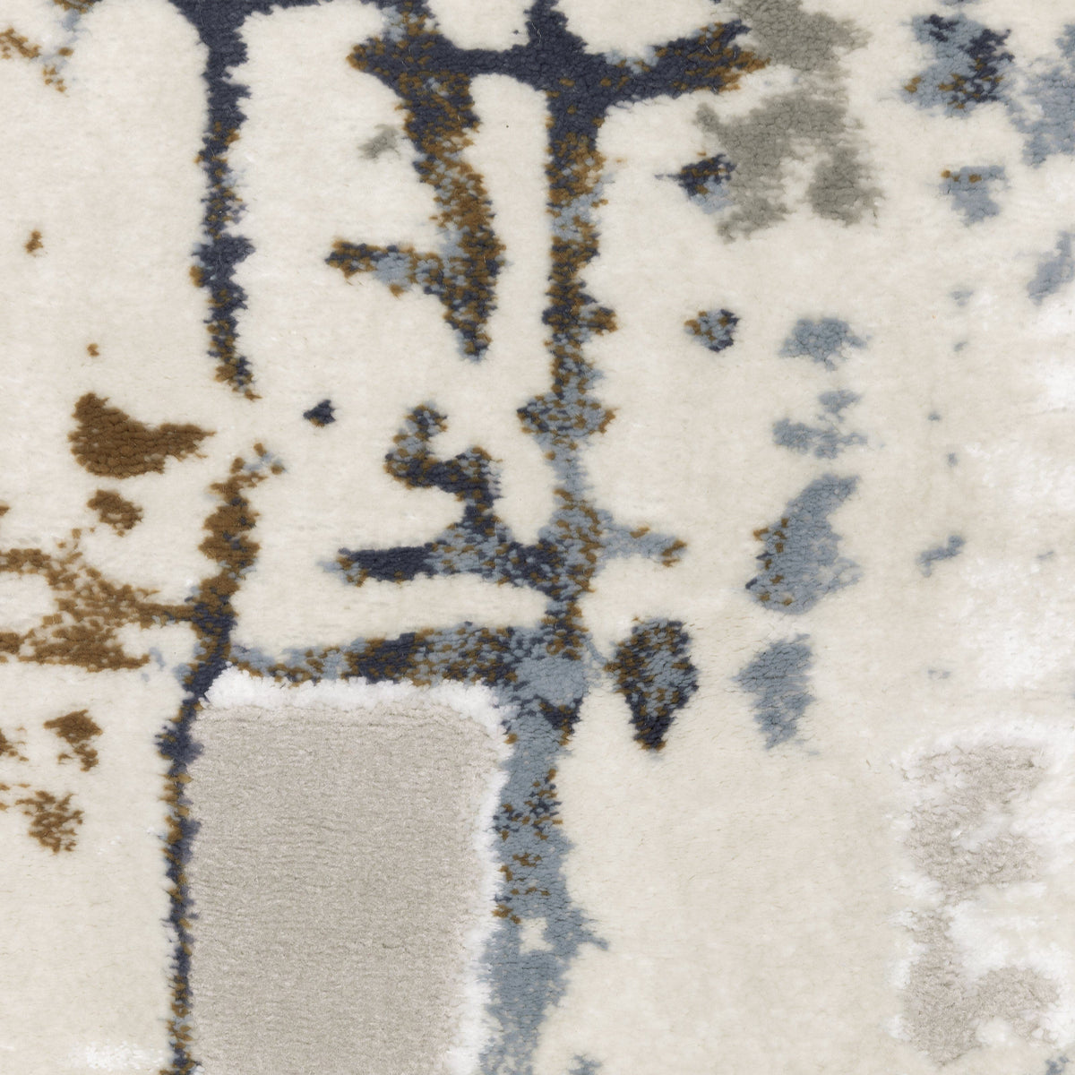 Close-up of Easton Grey & Blue Casual Rug with textured abstract design in blue, gray, and brown on a cream background.