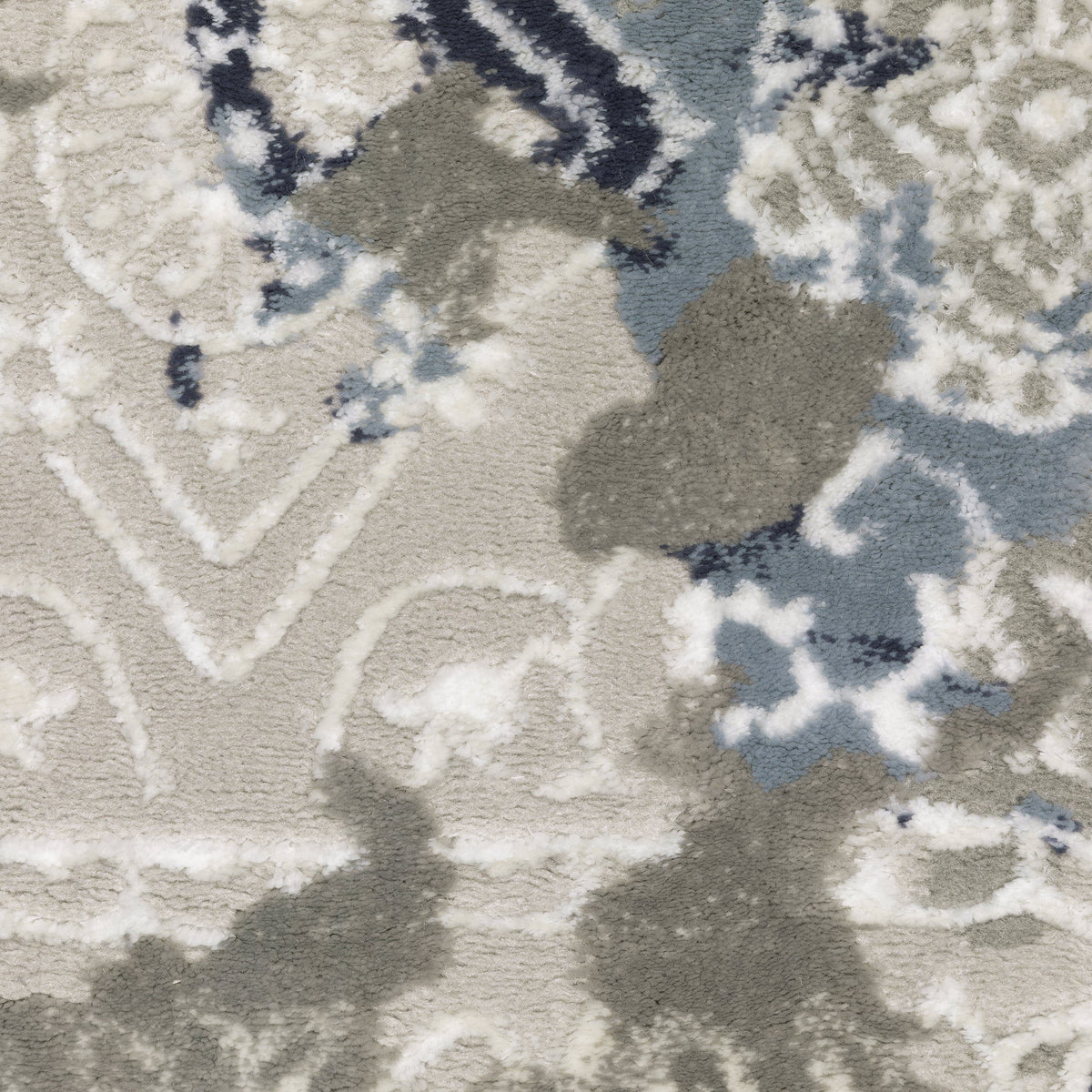 Close-up of Easton Grey & Blue Casual Rug with textured abstract pattern and contrasting yarns.