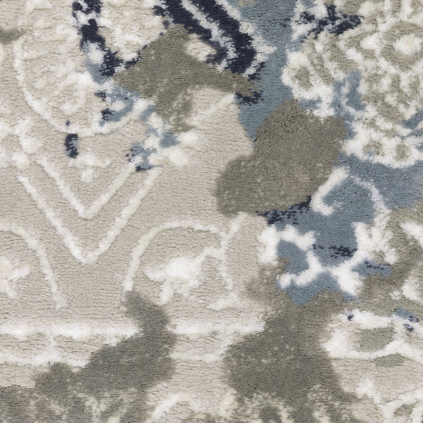 Close-up of Easton Grey & Blue Casual Rug with textured abstract pattern and contrasting yarns.