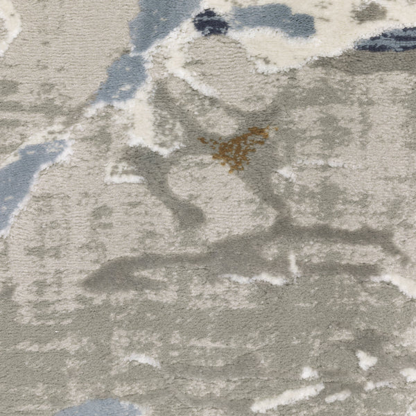 Easton Grey & Blue Casual Rug with textured abstract design and contrasting yarns.