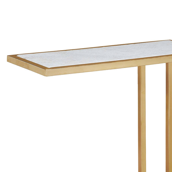 Echelon sofa hugger table with a white marble top and natural brass iron frame.