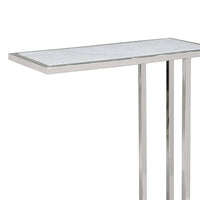 Echelon sofa hugger table with a white marble top and polished nickel iron frame.