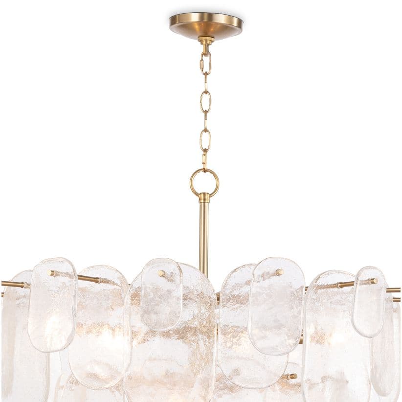 Modern Echo Chandelier with gold finish and striking water glass panes, providing a soft glow.