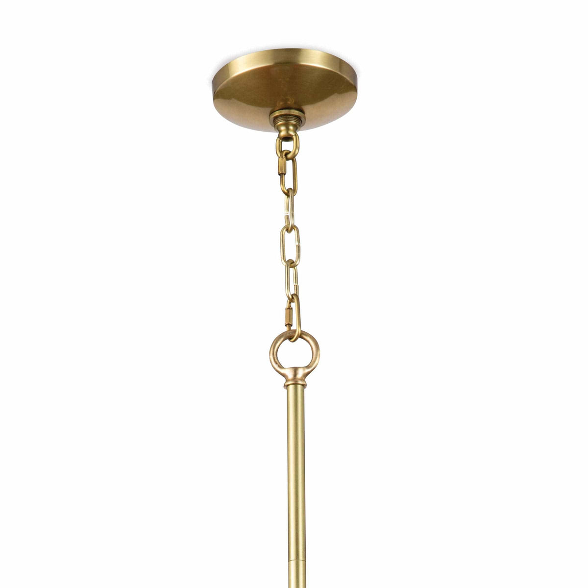 Eloise small white ceramic pendant light with natural brass accents and chain.