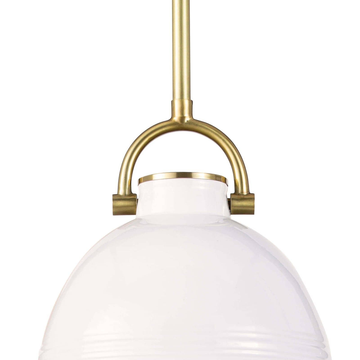 Small white ceramic Eloise pendant light with natural brass accents and a classic dome shape.