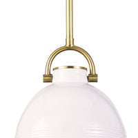 Small white ceramic Eloise pendant light with natural brass accents and a classic dome shape.