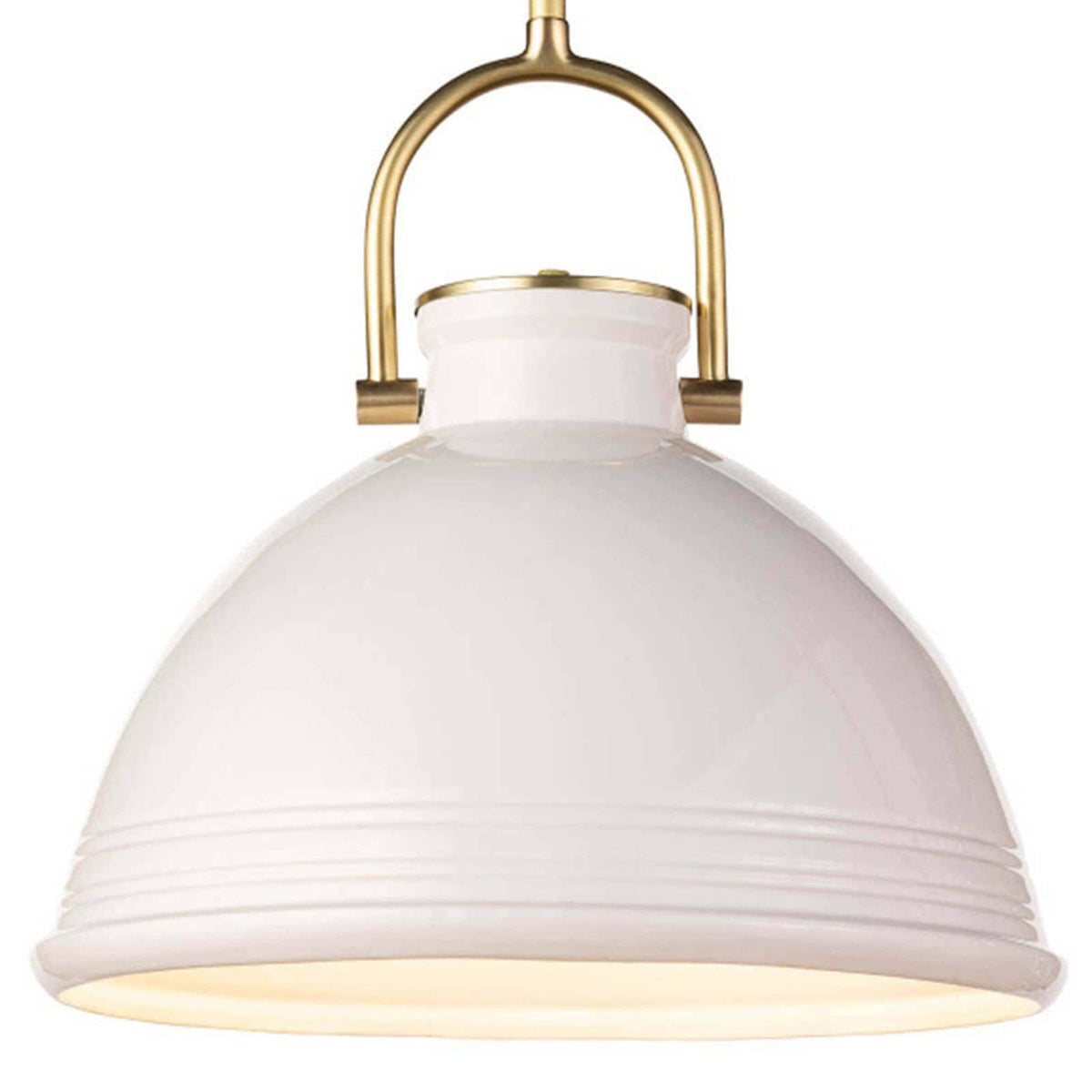 Eloise white ceramic pendant light with natural brass accents and a ribbed base.