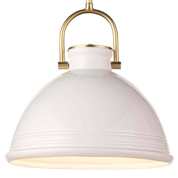 Eloise white ceramic pendant light with natural brass accents and a ribbed base.