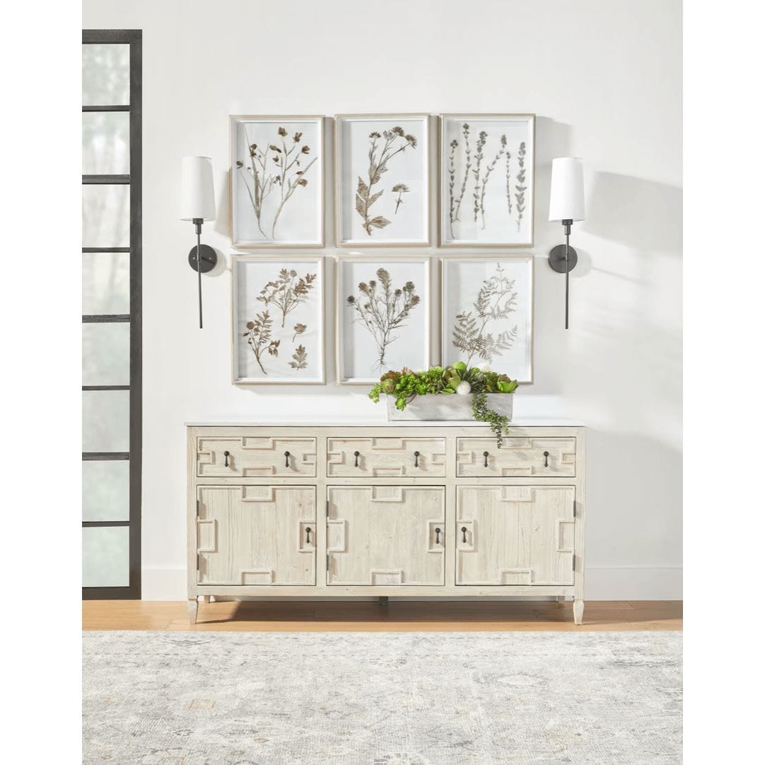 Emerie Media Sideboard: white and gray marble-look quartz top, light wood finish, geometric drawer/cabinet fronts.