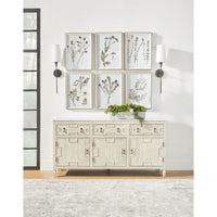 Emerie Media Sideboard: white and gray marble-look quartz top, light wood finish, geometric drawer/cabinet fronts.