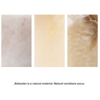 Three alabaster swatches showing natural variations in white, cream, and light brown tones.