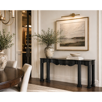 Elegant Estate Console in hand-rubbed black with classic style, featuring a scalloped apron and sturdy legs.
