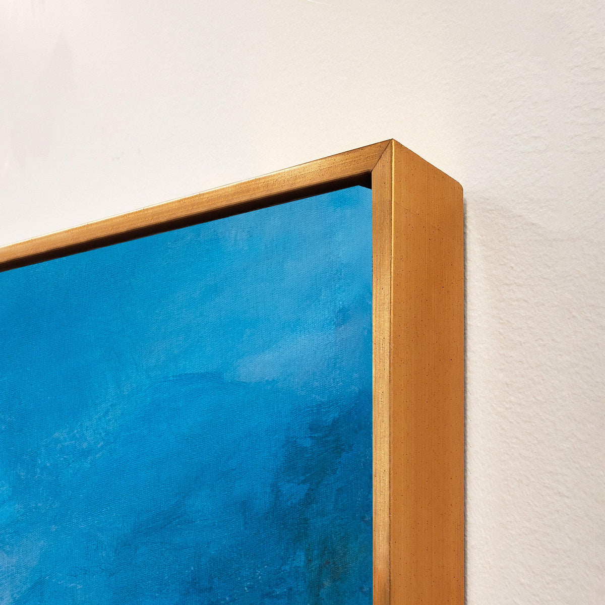 Ethereal Blue Giclee Canvas Painting with a gold frame, showcasing cool tonal depth and brush gel finish.