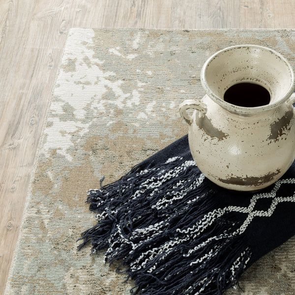 Evolution Beige & Grey Contemporary Rug with natural landscape design, textured yarns, and distressed vase.