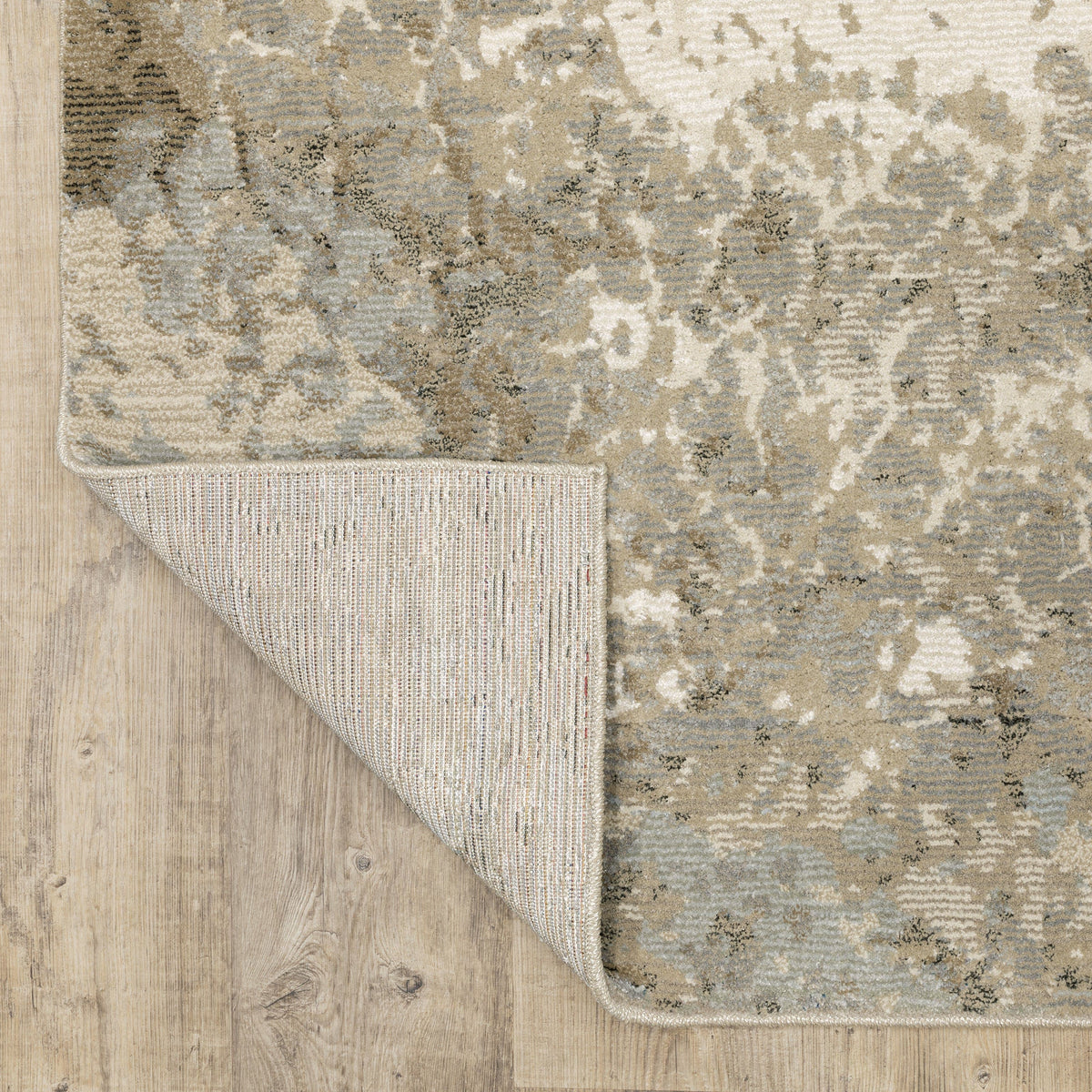 Evolution Beige & Grey Contemporary Rug with abstract design, textured yarns, and woven polypropylene backing.