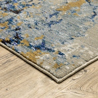 Evolution Blue & Gold Contemporary Rug with abstract design, textured nylon/polypropylene blend.