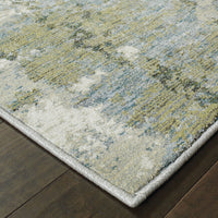 Evolution Blue & Green Contemporary Rug with abstract landscape design, textured nylon/polypropylene blend.