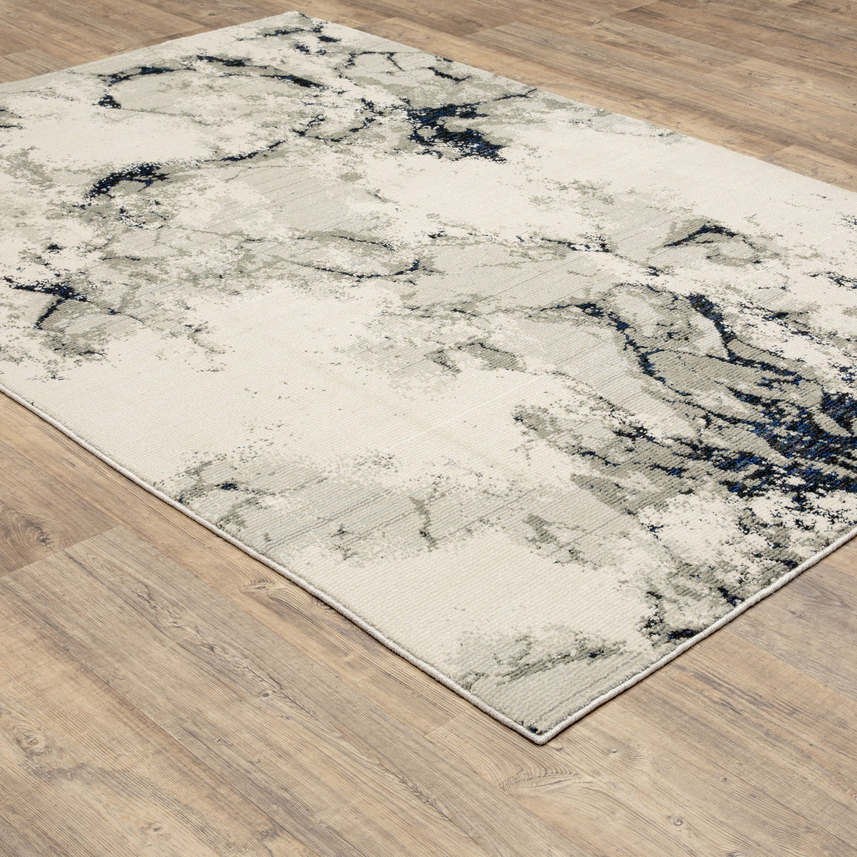 Evolution Contemporary Rug: Ivory, Charcoal & Black with natural landscape design, shiny and matte yarns.