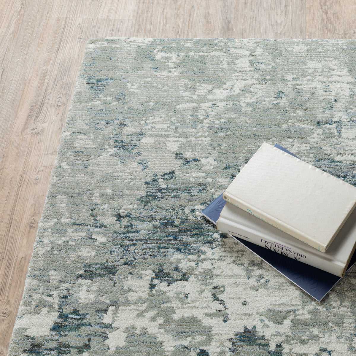 Evolution Grey & Blue Contemporary Rug with abstract landscape design, textured nylon/polypropylene blend.