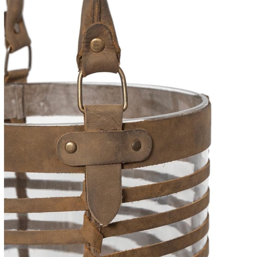 Small Finn leather hurricane with clear glass and woven brown leather base.