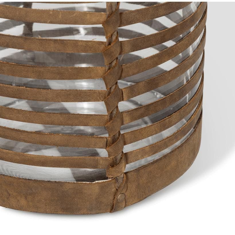 Small Finn leather hurricane with woven brown leather base and clear glass.
