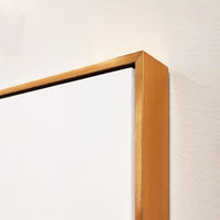 Close-up of Following Thought II artwork, showing a white gallery-wrapped canvas with a gold floating frame.