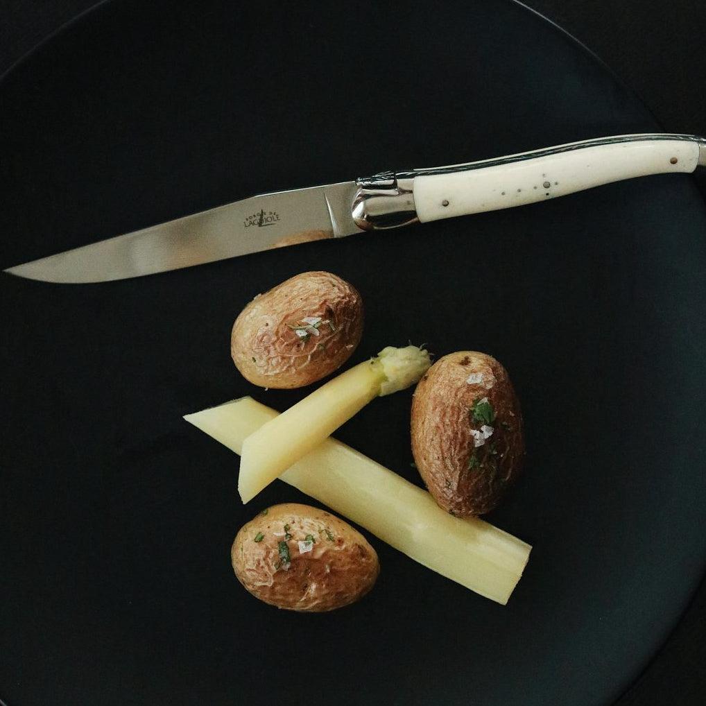 Forge de Laguiole 6 Piece Steak Knife Set Bone Handle - Knife Handle Detail | Bone & Brass
