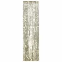 Grey & ivory casual viscose rug with organic abstract patterns and hand-carved high-low texture.