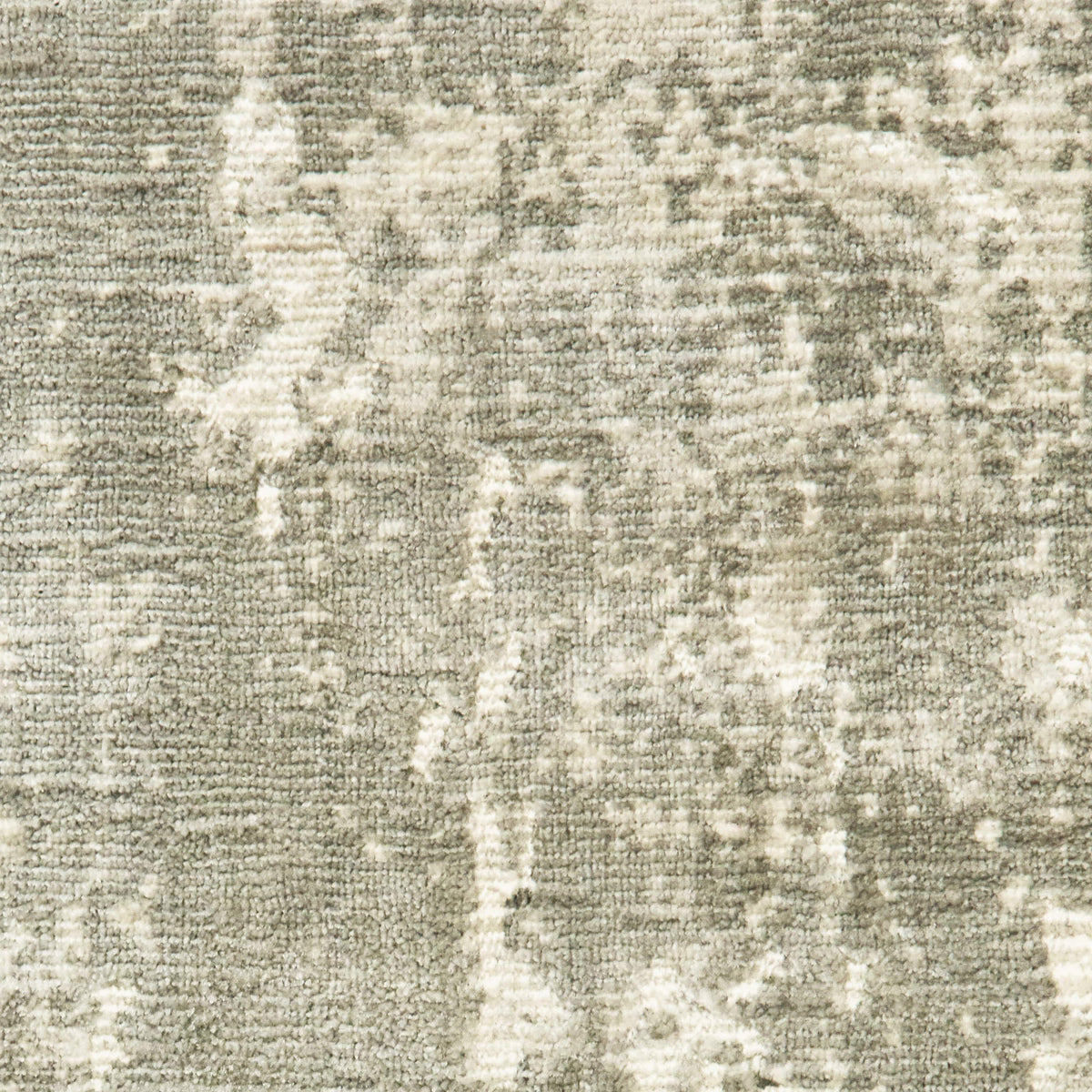 Close-up of Formations Grey & Ivory Casual Rug, showing organic abstract patterns and hand-carved high-low texture.