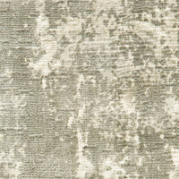 Close-up of Formations Grey & Ivory Casual Rug, showing organic abstract patterns and hand-carved high-low texture.