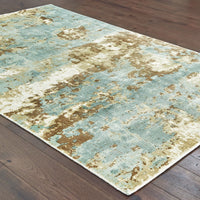 Formations Spa Blue & Brown Casual Rug with organic abstract patterns and hand-carved high-low texture.