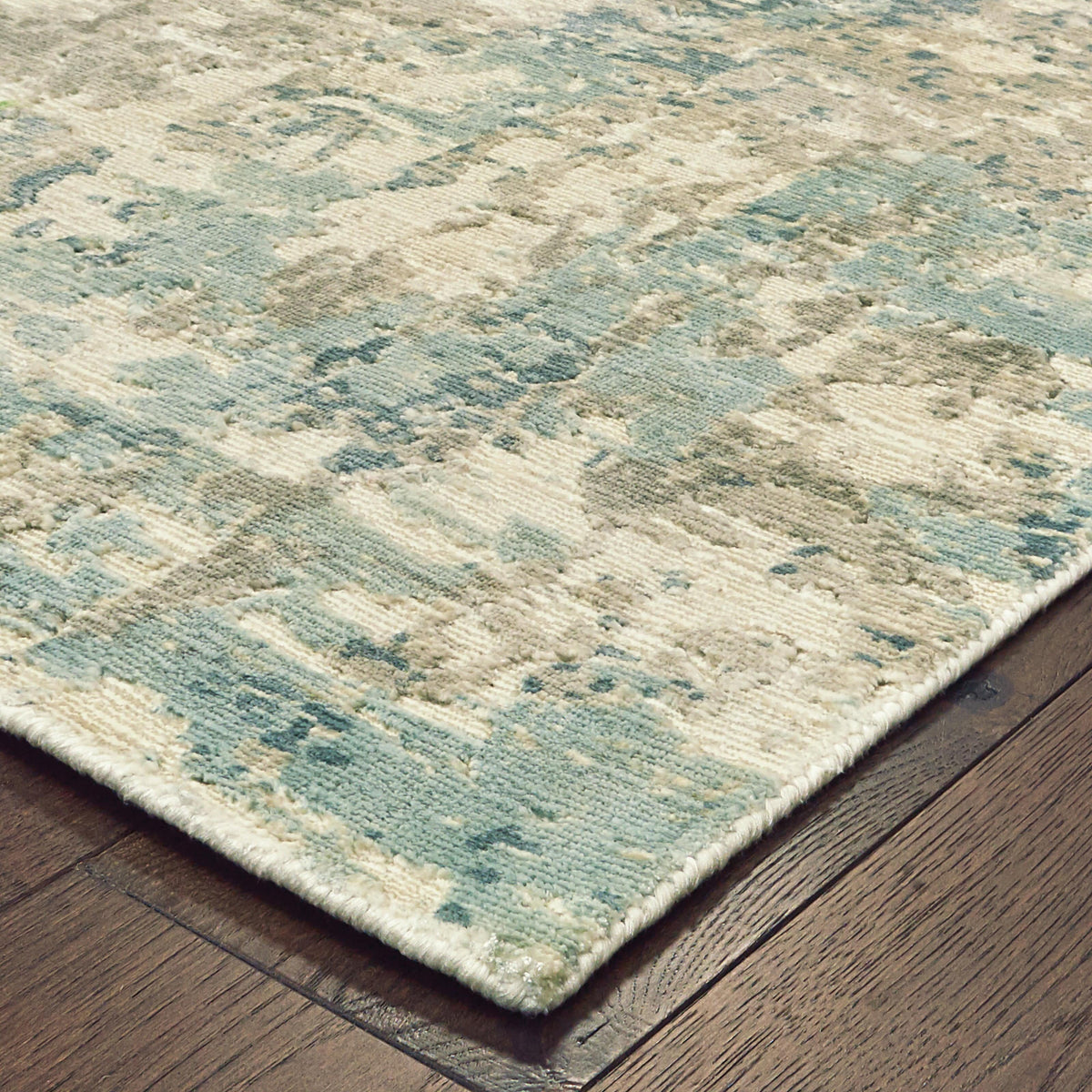 Formations Spa Blue & Green Casual Rug with organic abstract patterns and textured hand-carved viscose.