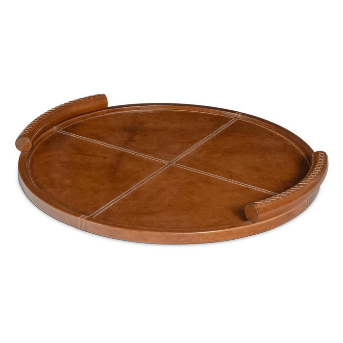 Round cognac leather tray with baseball stitching and lace-stitched oversized handles.