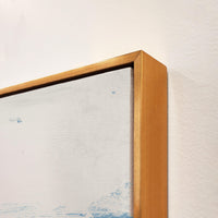 Close-up of Free Falling III Giclee Canvas Painting with a gold frame and visible brush gel finish.