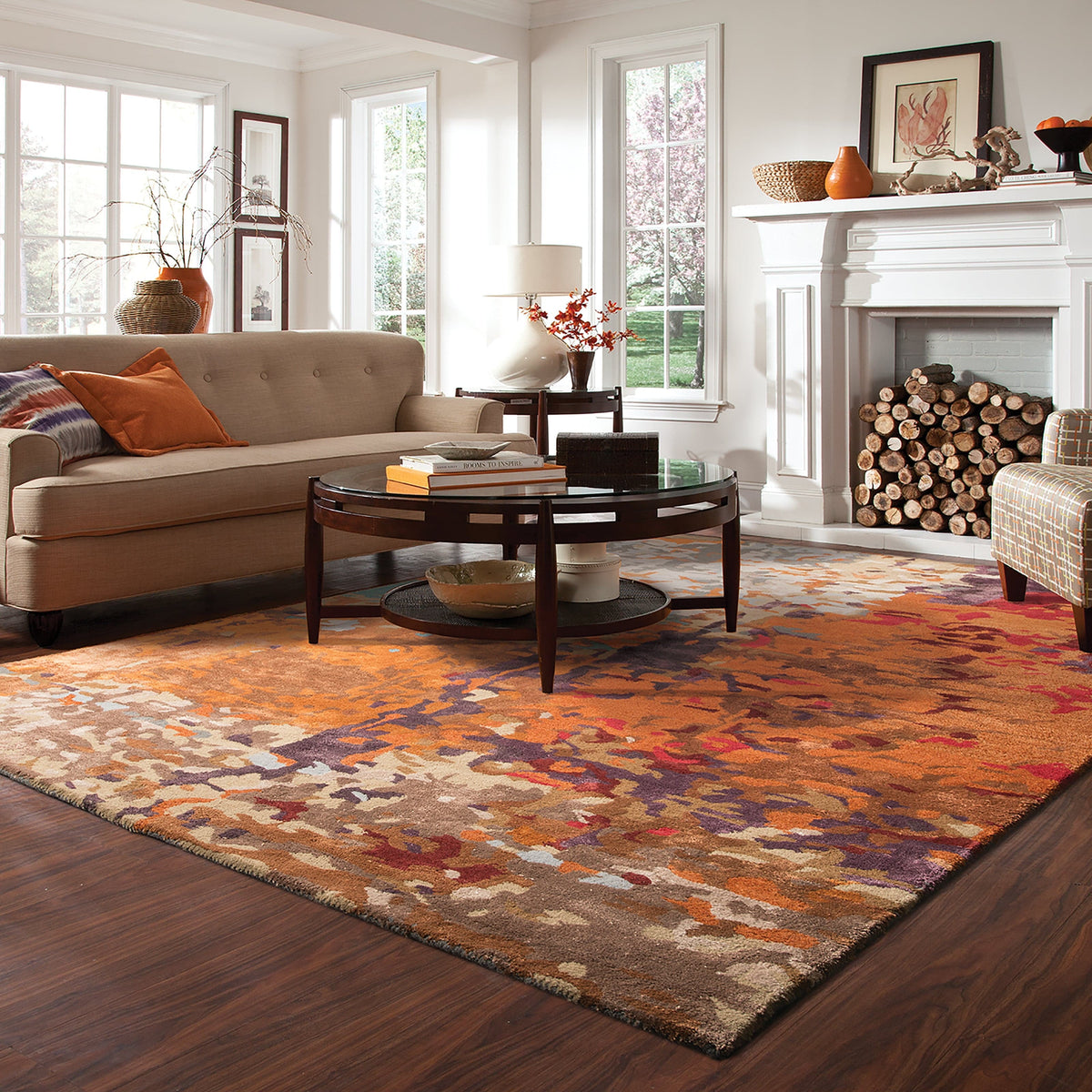 Galaxy Multi & Orange Contemporary Rug with abstract patterns in a living room.
