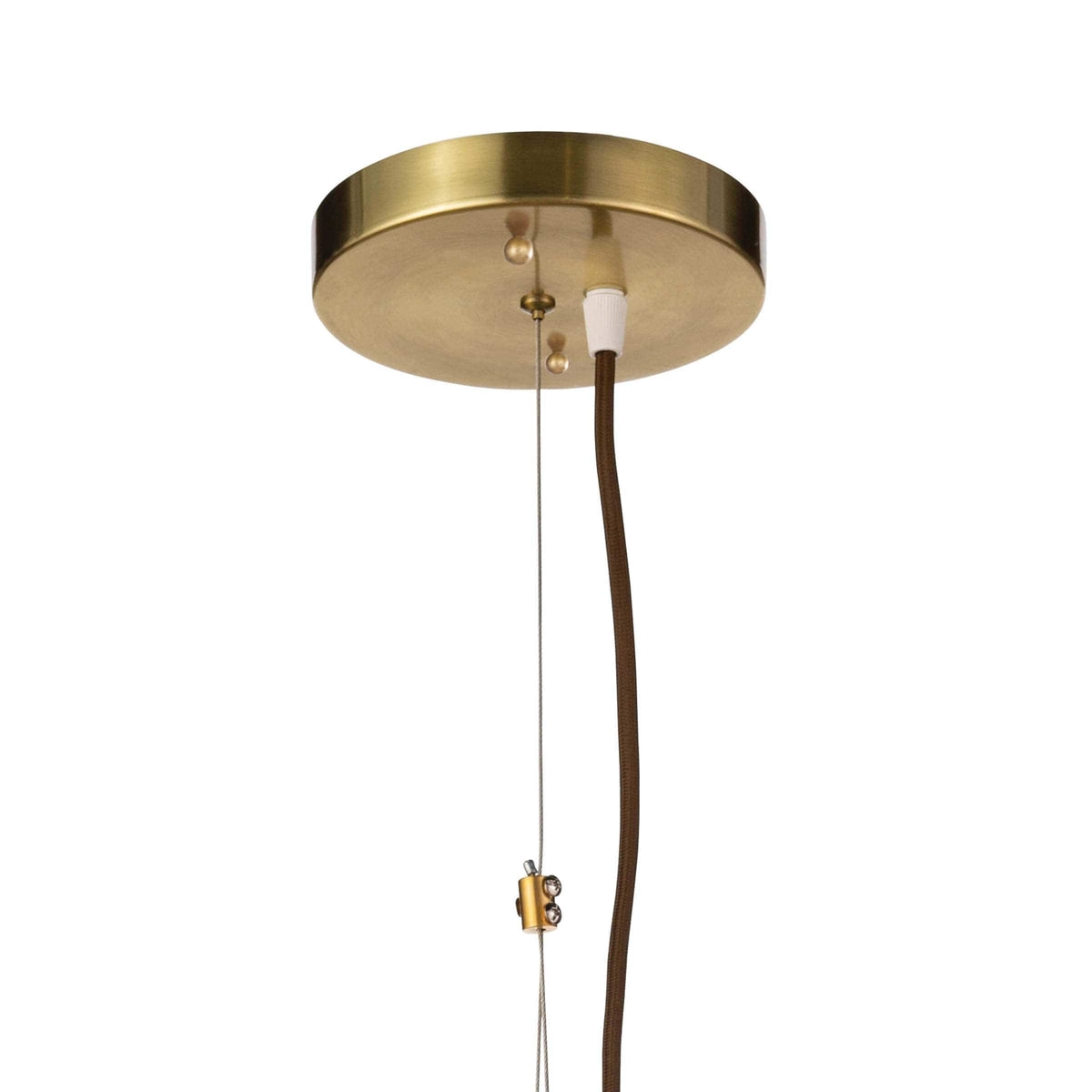 Close-up of a round, natural brass ceiling canopy with a brown cord and suspension wire.