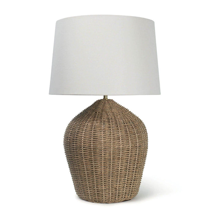 Georgian table lamp with a natural rattan base and a simple natural linen shade.