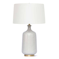 Glace ceramic table lamp with natural hues, brass base, and hand-rolled natural linen shade.