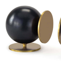 Modern Grant Black & Brass Bookends: spherical black metal body with a natural brass disc base.