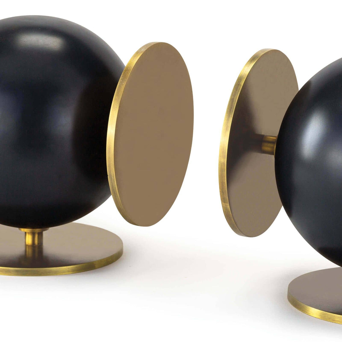 Modern Grant Black & Brass Bookends with spherical metal bodies and natural brass disc bases.