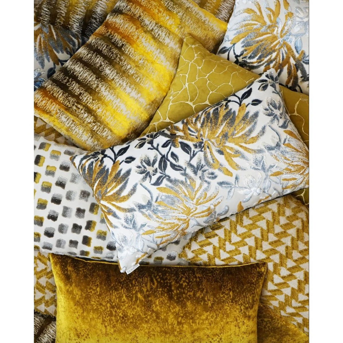 Luxury Grated Ochre Golden Throw Pillow with varied textures, patterns, and a feather down insert.
