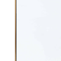 Natural brass hanging rectangle mirror with a thin frame.